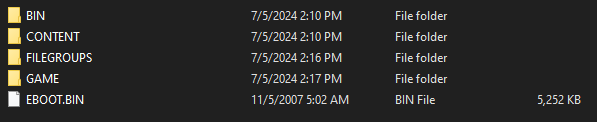 Screenshot of the PS3 folder showing 4 directories: BIN, CONTENT, FILEGROUPS, GAME, and one file, EBOOT.BIN